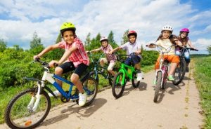 bambini in bicicletta parmakids